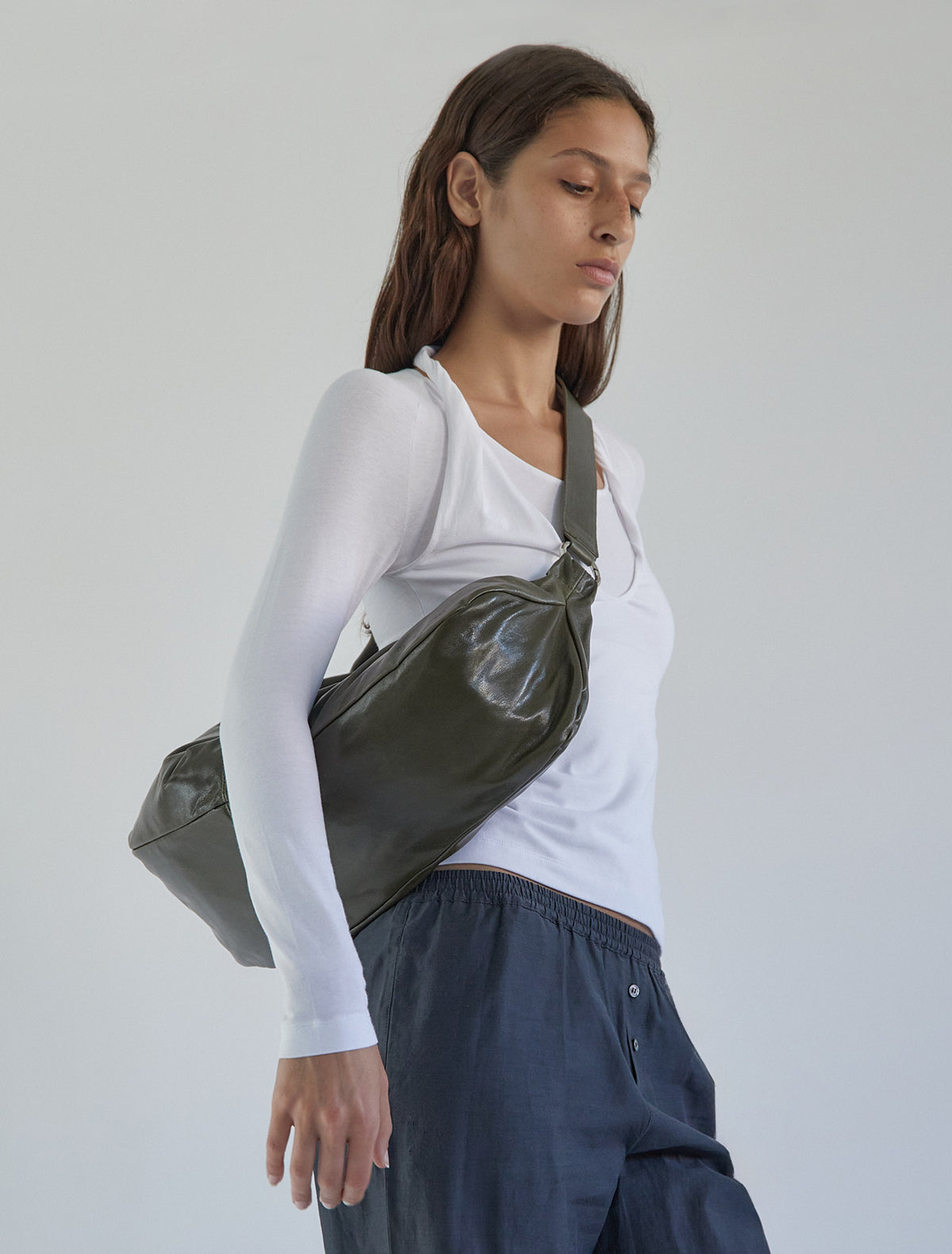 Dry elongated wrap around hobo style shoulder bag khaki