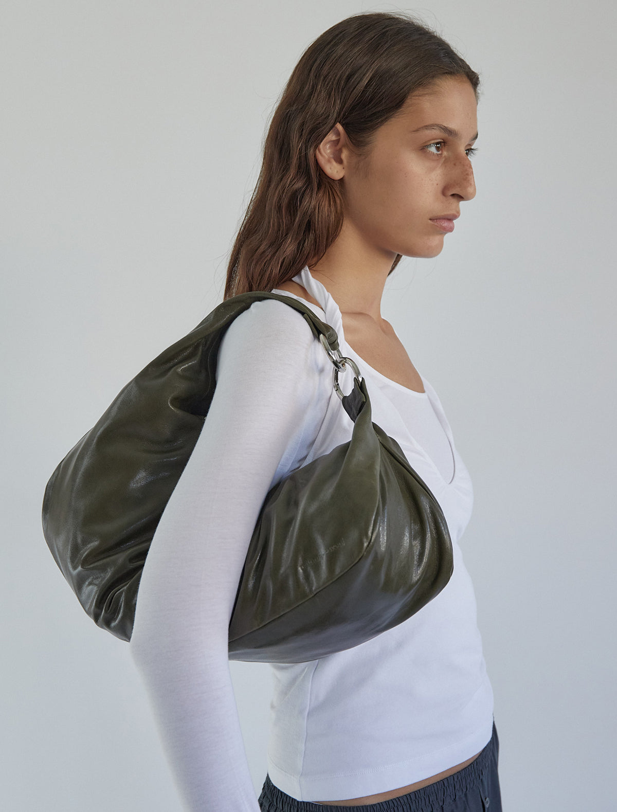 Dry elongated wrap around hobo style shoulder bag khaki