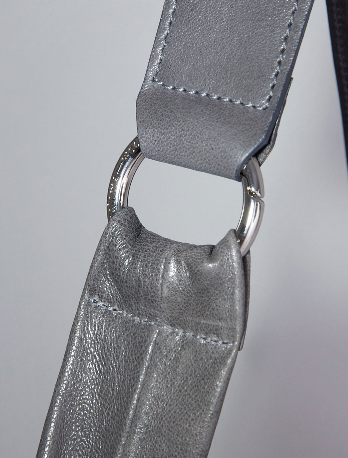 Dry elongated wrap around hobo style shoulder bag grey