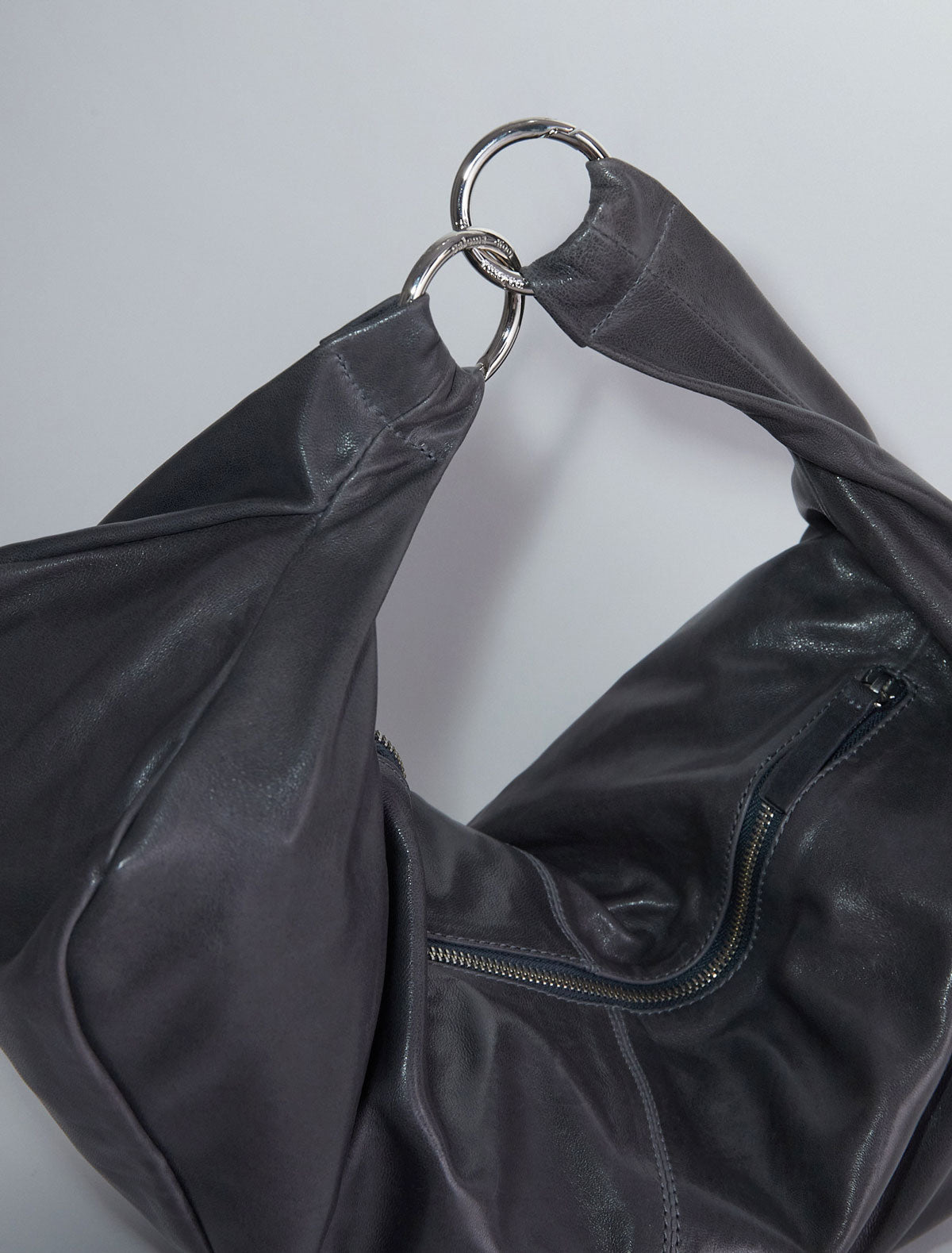 Dry elongated wrap around hobo style shoulder bag grey