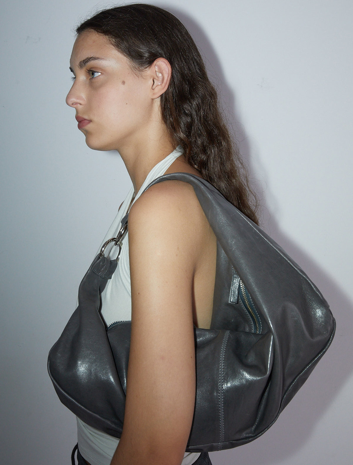 Dry elongated wrap around hobo style shoulder bag grey