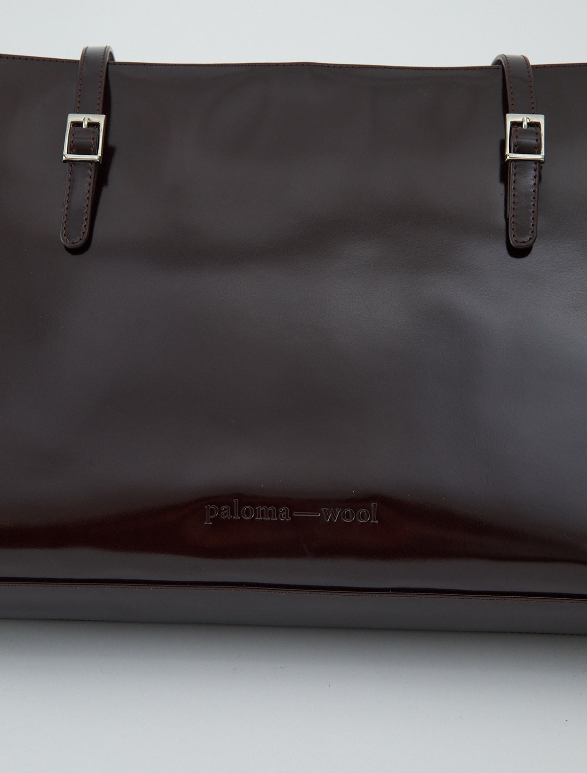 Caye new leather bag embossed logo brown