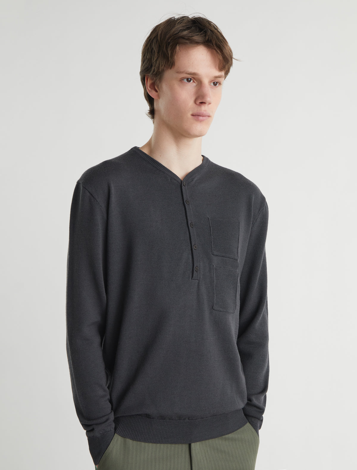 MARIO-V-neck wool sweater with a front placket and pocket