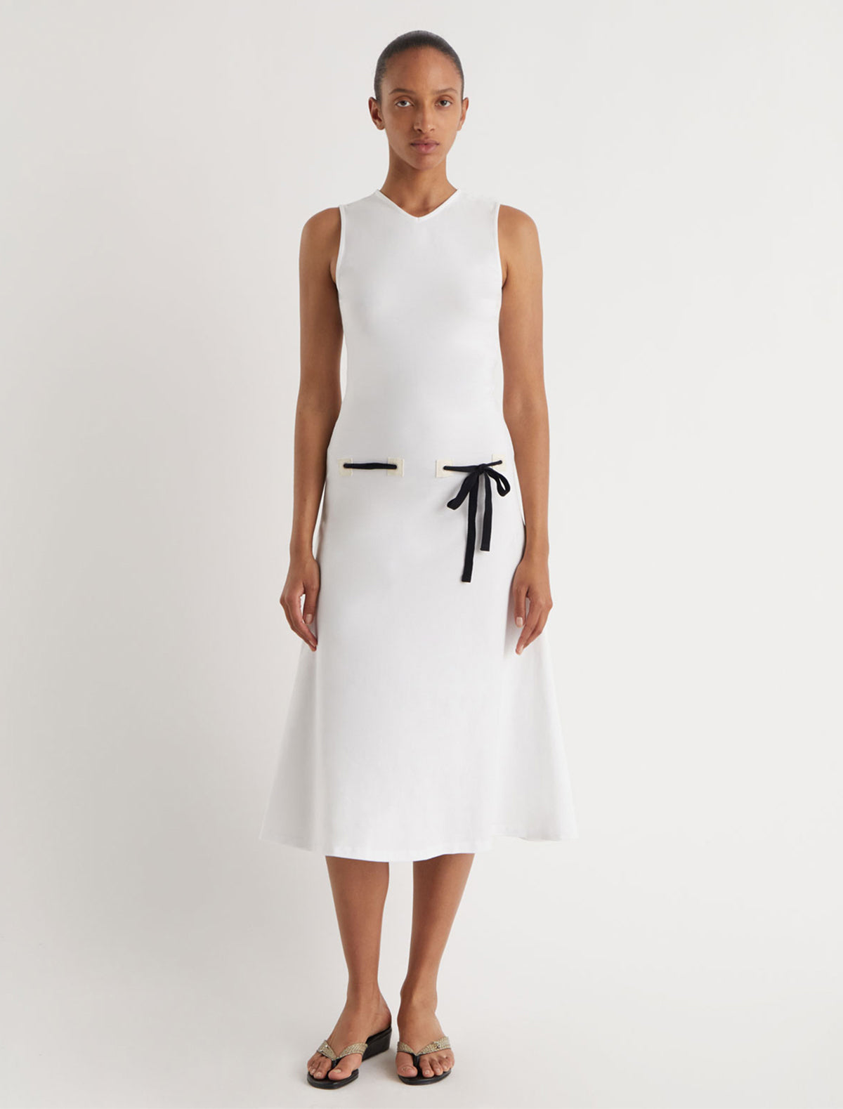 SUNI-White dress with fabric patch details at the hips featuring