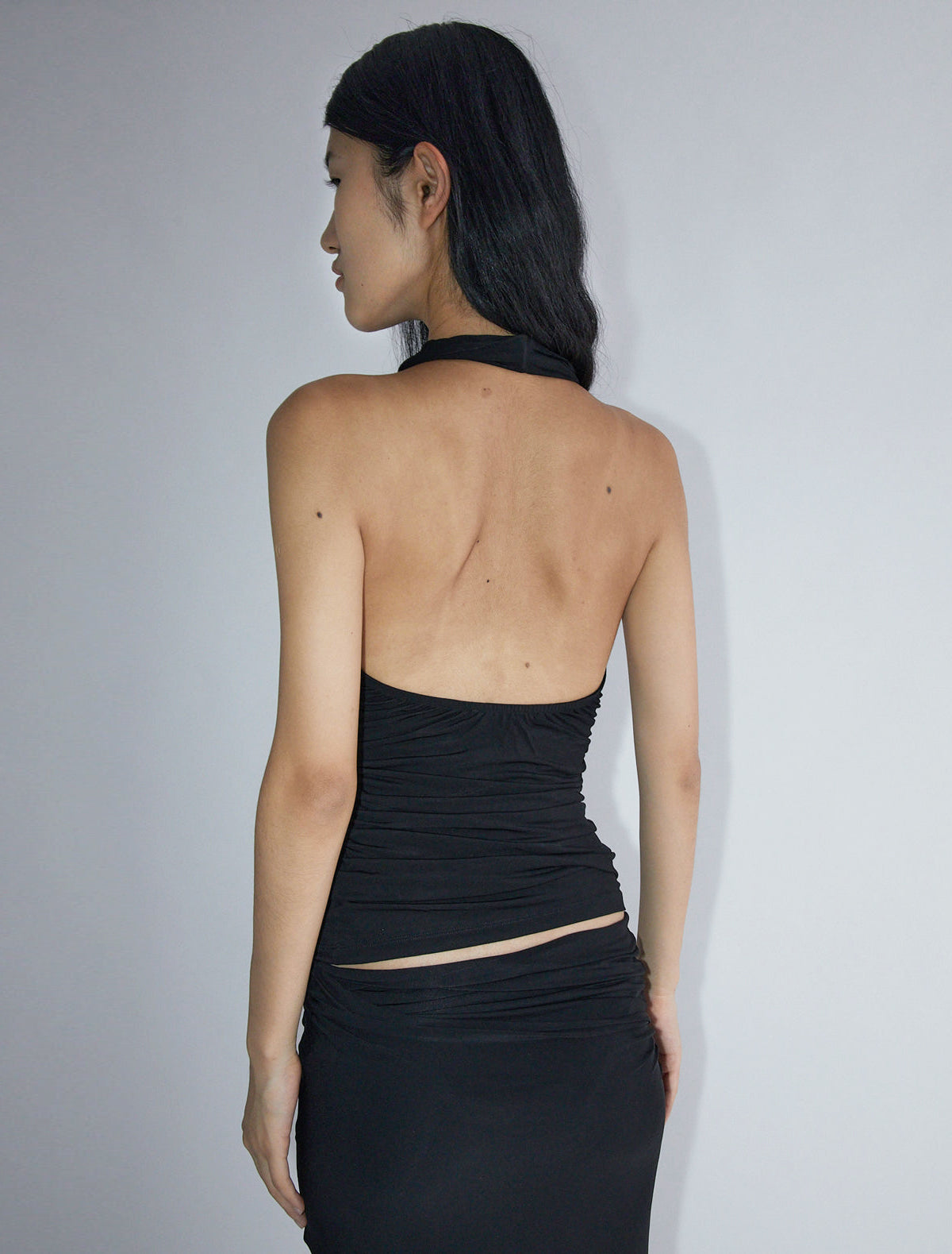 Fryda halter top open back gathered sides black