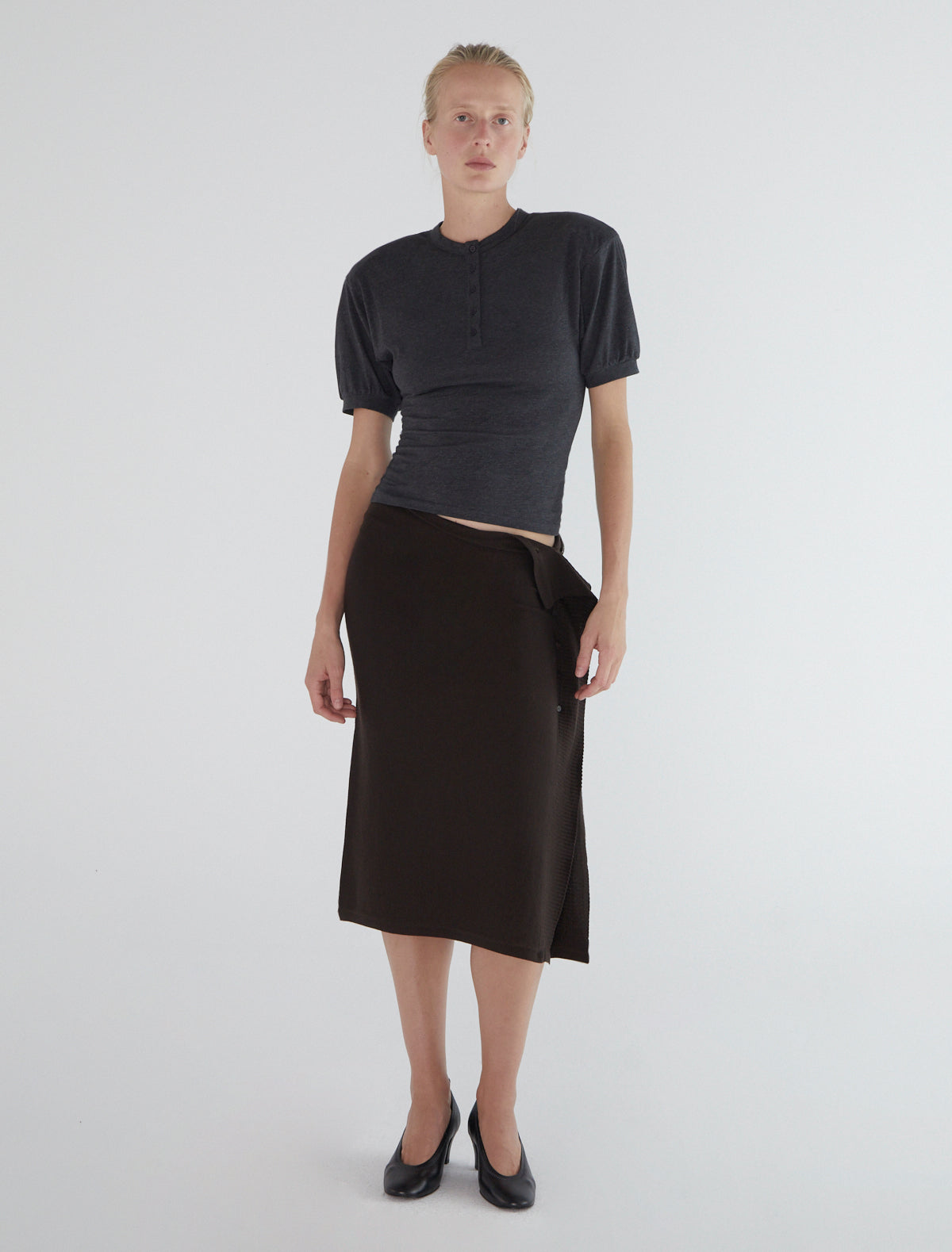 CHARCO-Wrap skirt, featuring side buttons for opening and closure