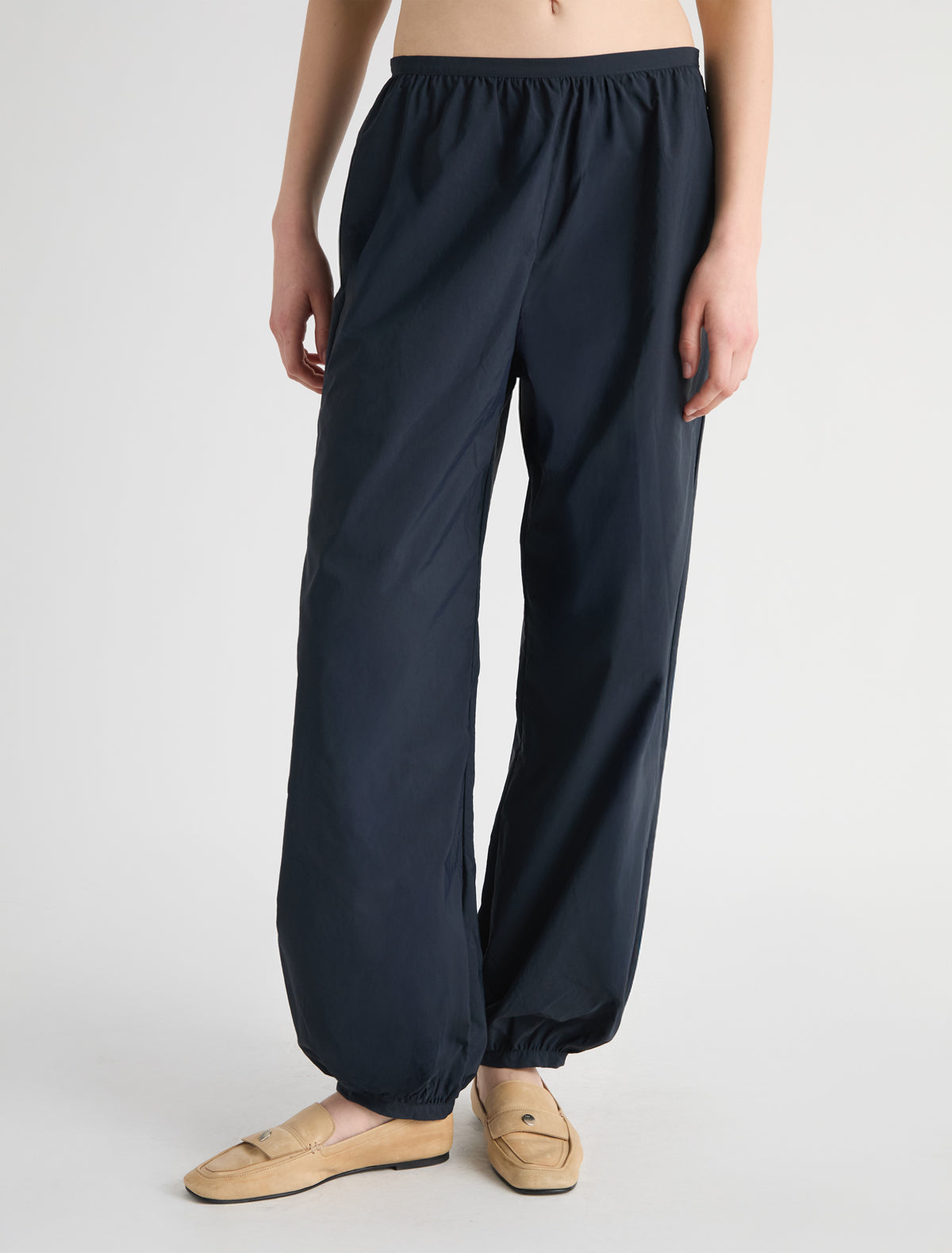 BOZA-Navy balloon-style pants made from soft nylon with a slight