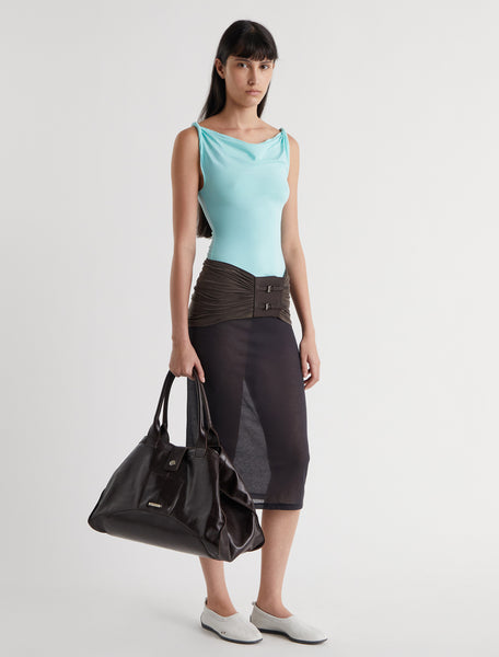 SIMP-Light blue sleeveless top featuring twisted shoulder details