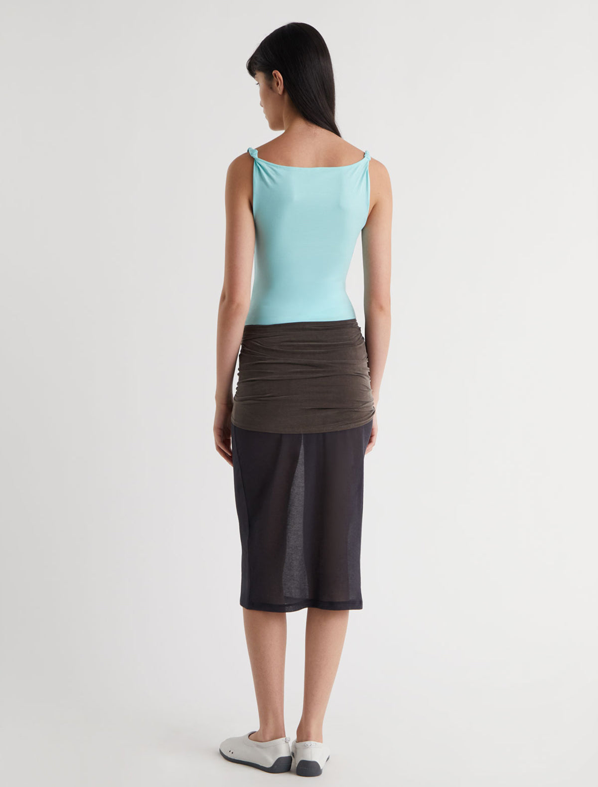 SIMP-Light blue sleeveless top featuring twisted shoulder details