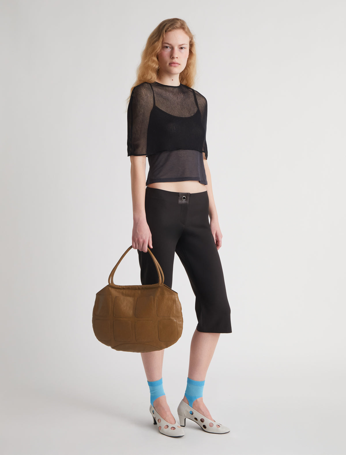 SALIN-Fitted capri trousers with small side slits finished with