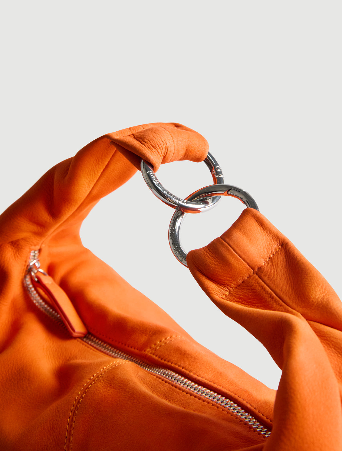 Mini dry elongated mini wrap around hobo style shoulder bag orange