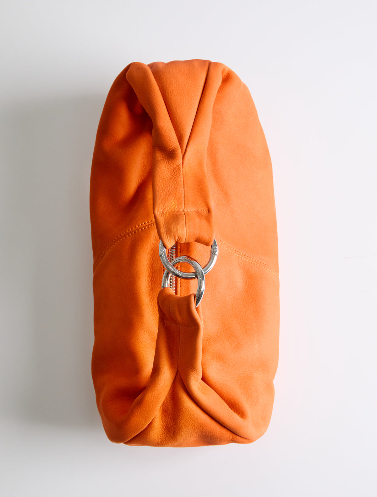 Mini dry elongated mini wrap around hobo style shoulder bag orange