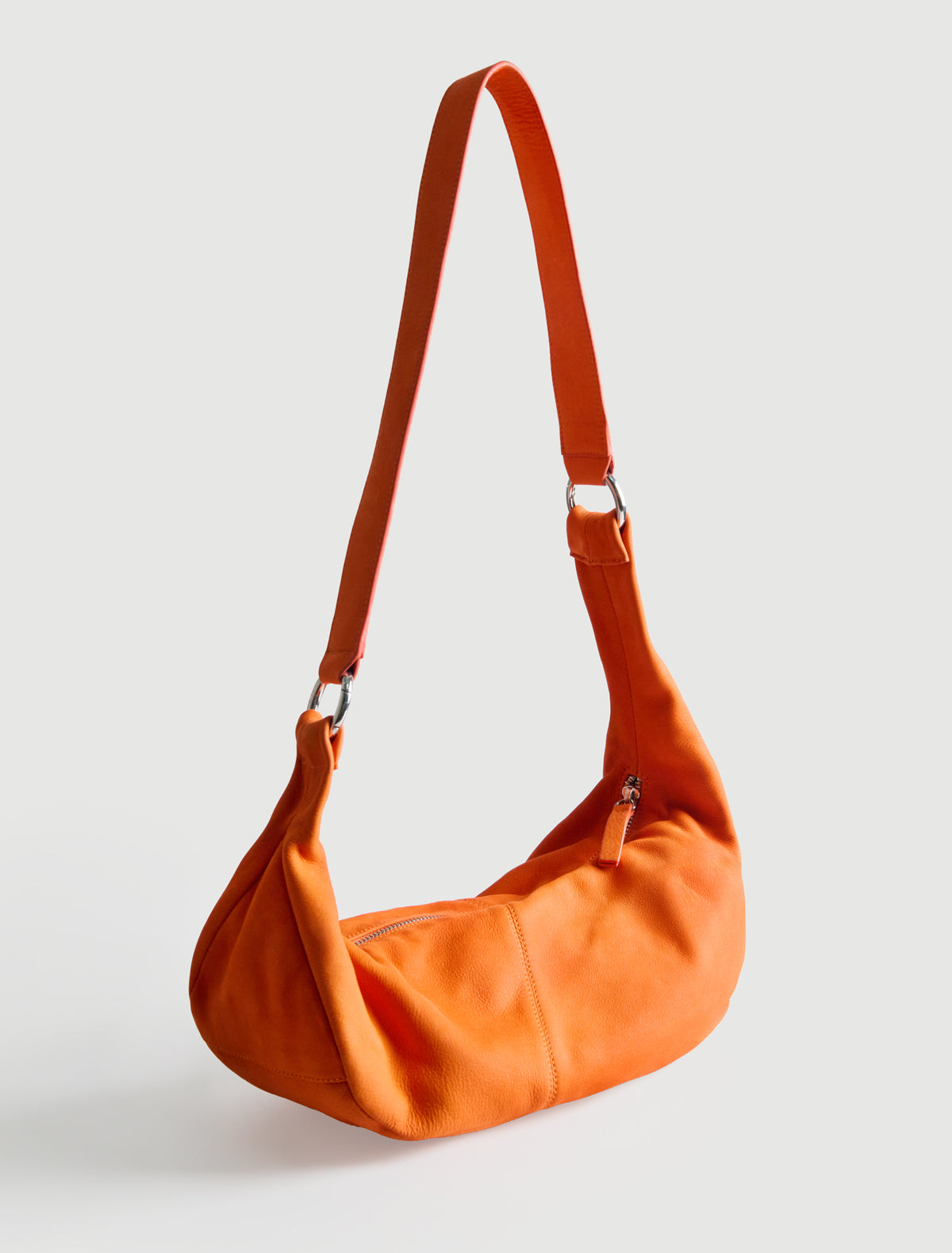 Mini dry elongated mini wrap around hobo style shoulder bag orange