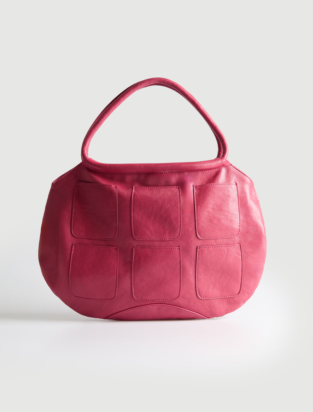 Pockets round shaped shoulder bag multiple pocket details fuchsia