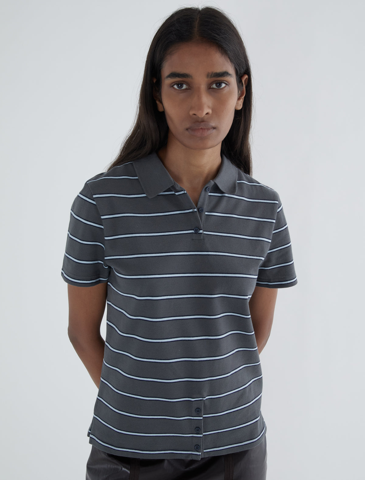 Julieta striped pique polo buttoned placket lower front grey