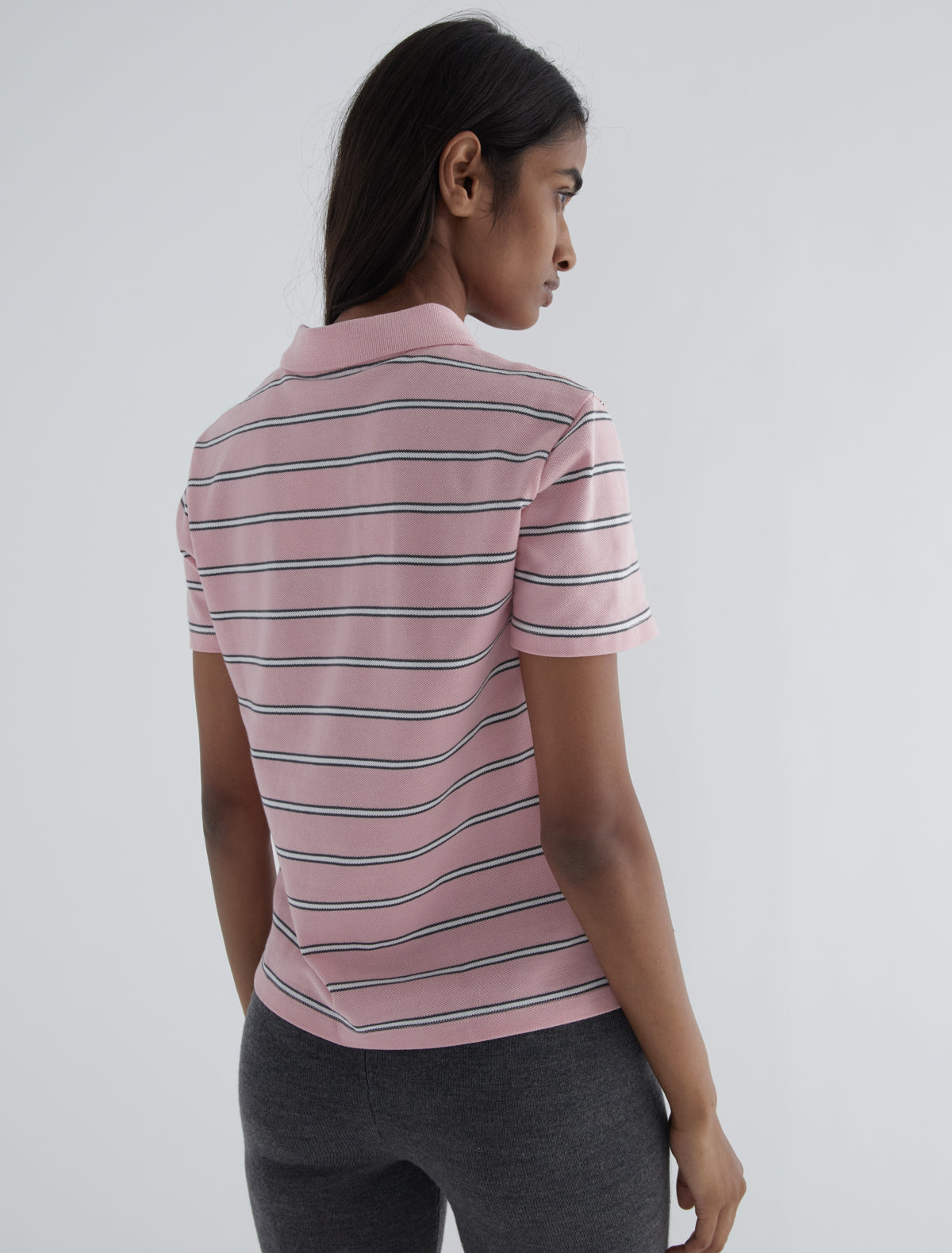 Julieta striped pique polo buttoned placket lower front pink