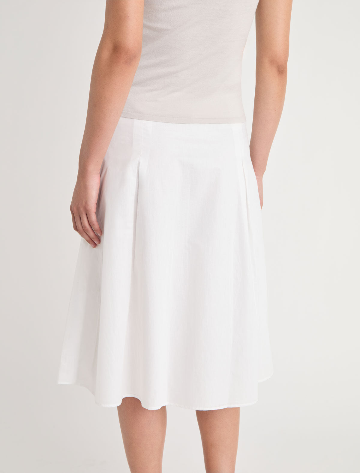 DIMI-White midi skirt with a flared silhouette and front pocket