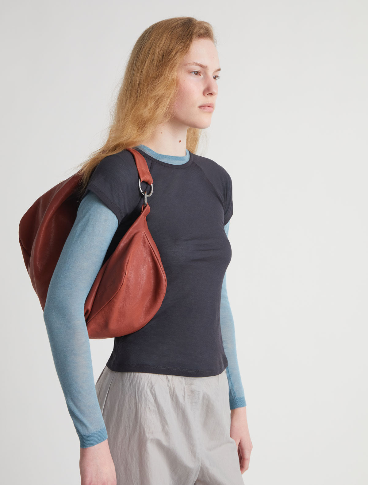 DRY-Terracotta elongated, wrap-around hobo-style shoulder bag