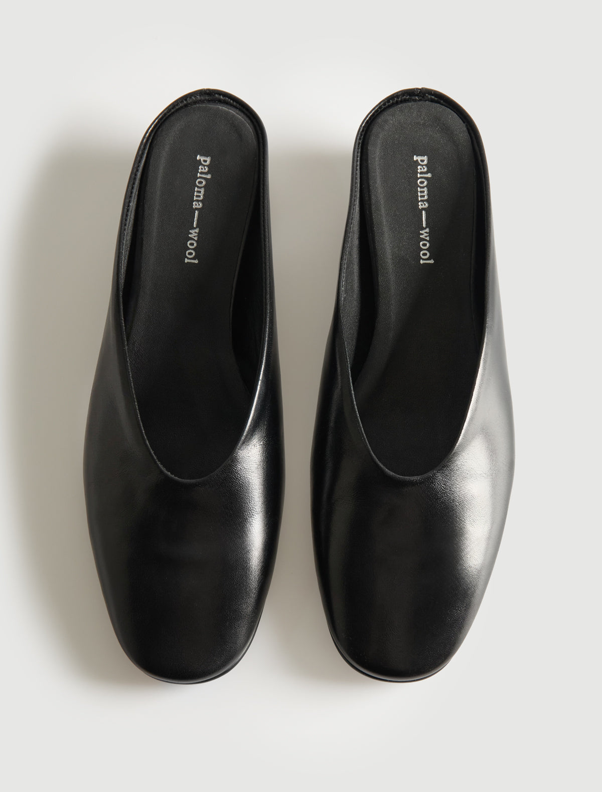 FERNANDA-Black round-toe mule featuring a low wedge heel – paloma wool