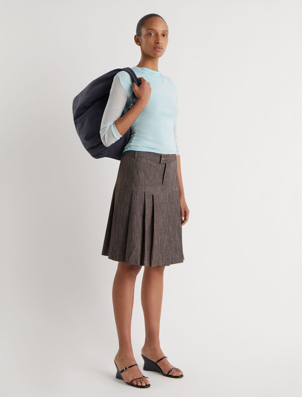 LAI-Elastic low-waisted midi pleated skirt. – paloma wool