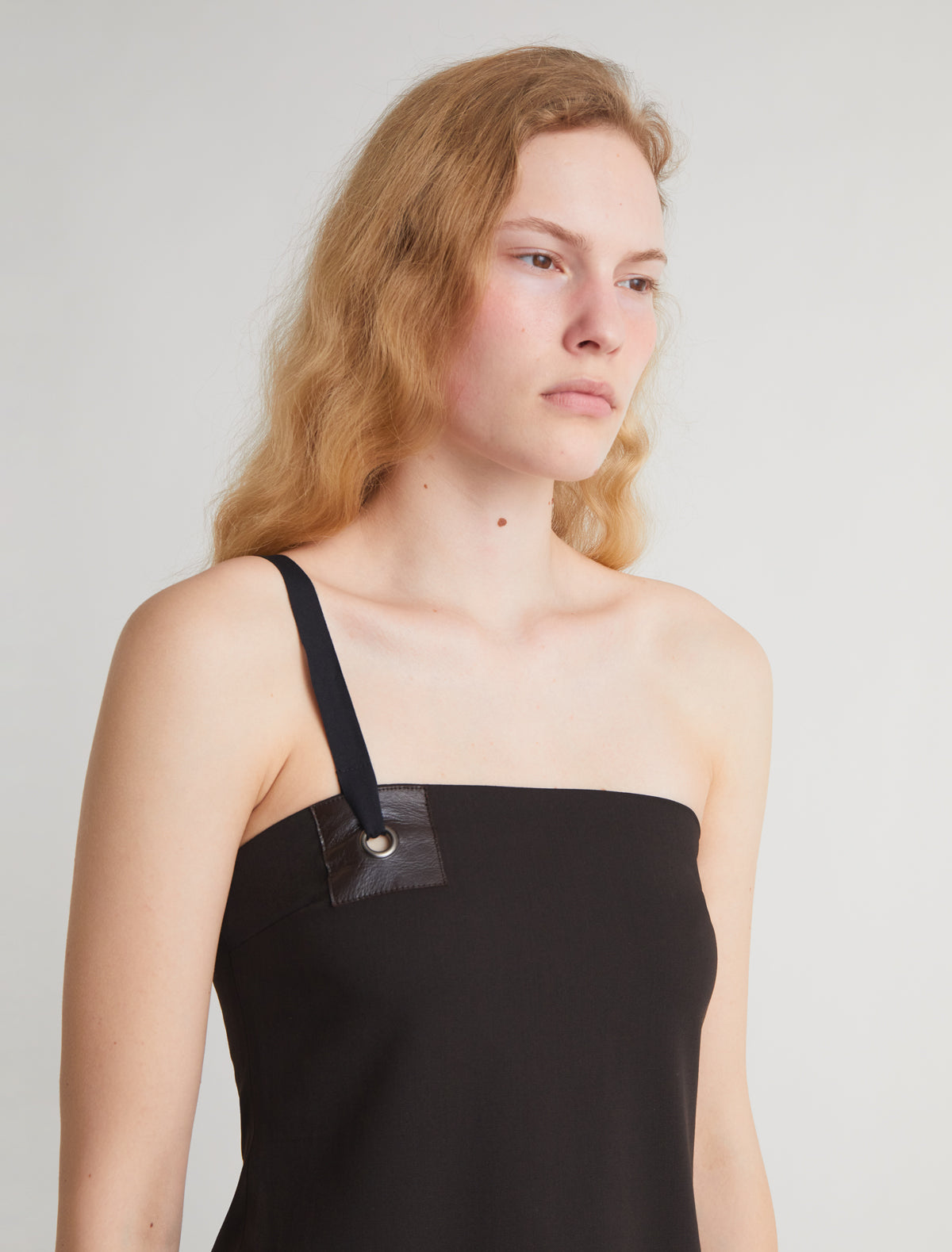 LALI-Dark brown bandeau top featuring a leather detail with an