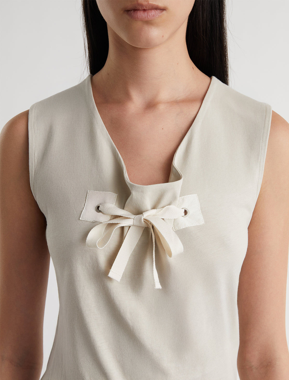 Manir sleeveless top chest patch eyelet adjustable strap ecru