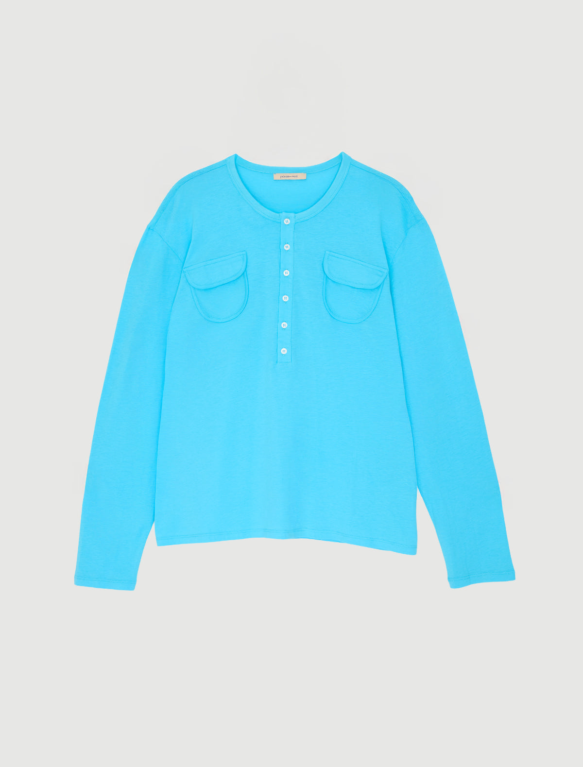 Nestor b long sleeve top crewneck chest pockets central button placket blue