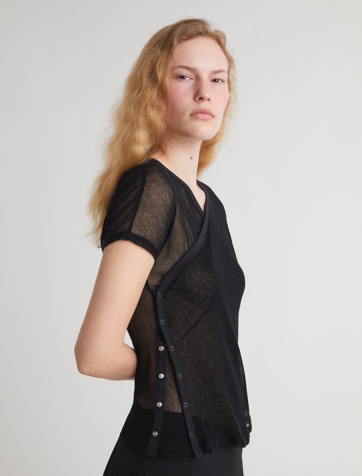 OLIMPIA-Black crossed raglan tulle top with side snap closures