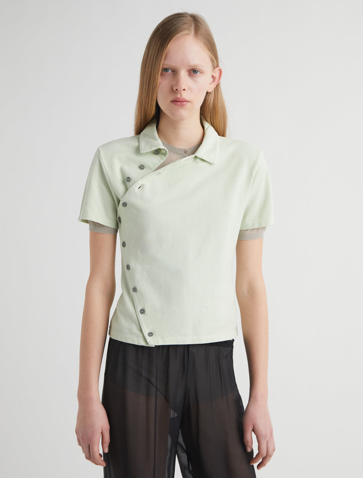 Nico short sleeved asymmetric buttoned top green