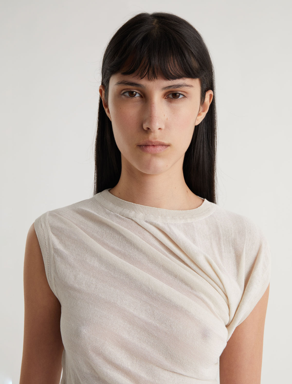RAVEN-Off-white aymmetric draped top with a striped-effect knit