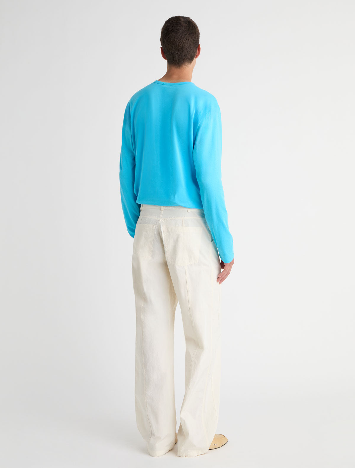 Nestor b long sleeve top crewneck chest pockets central button placket blue