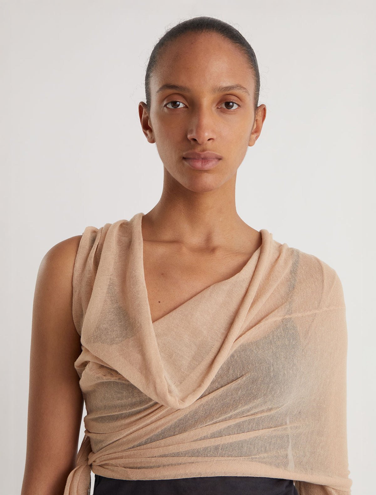 SAMIRA-Beige wrap-style knit top with an asymmetric design