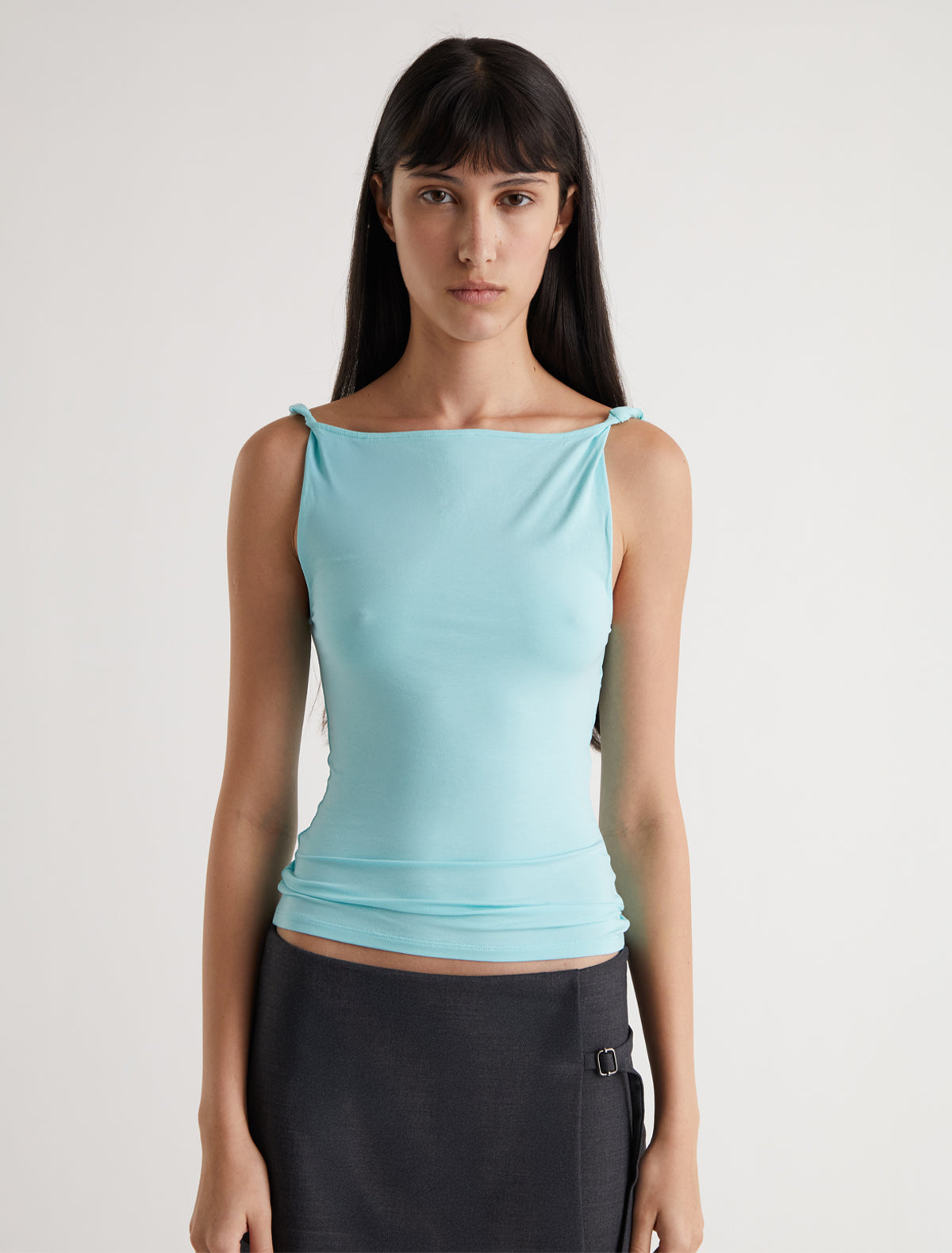 SIMP-Light blue sleeveless top featuring twisted shoulder details