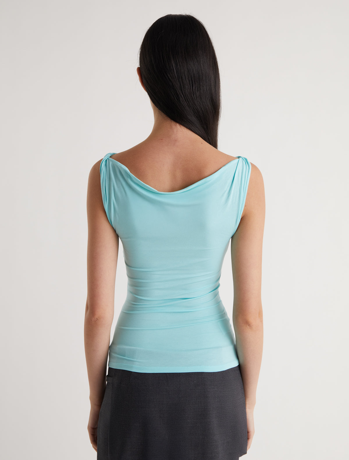 SIMP-Light blue sleeveless top featuring twisted shoulder details
