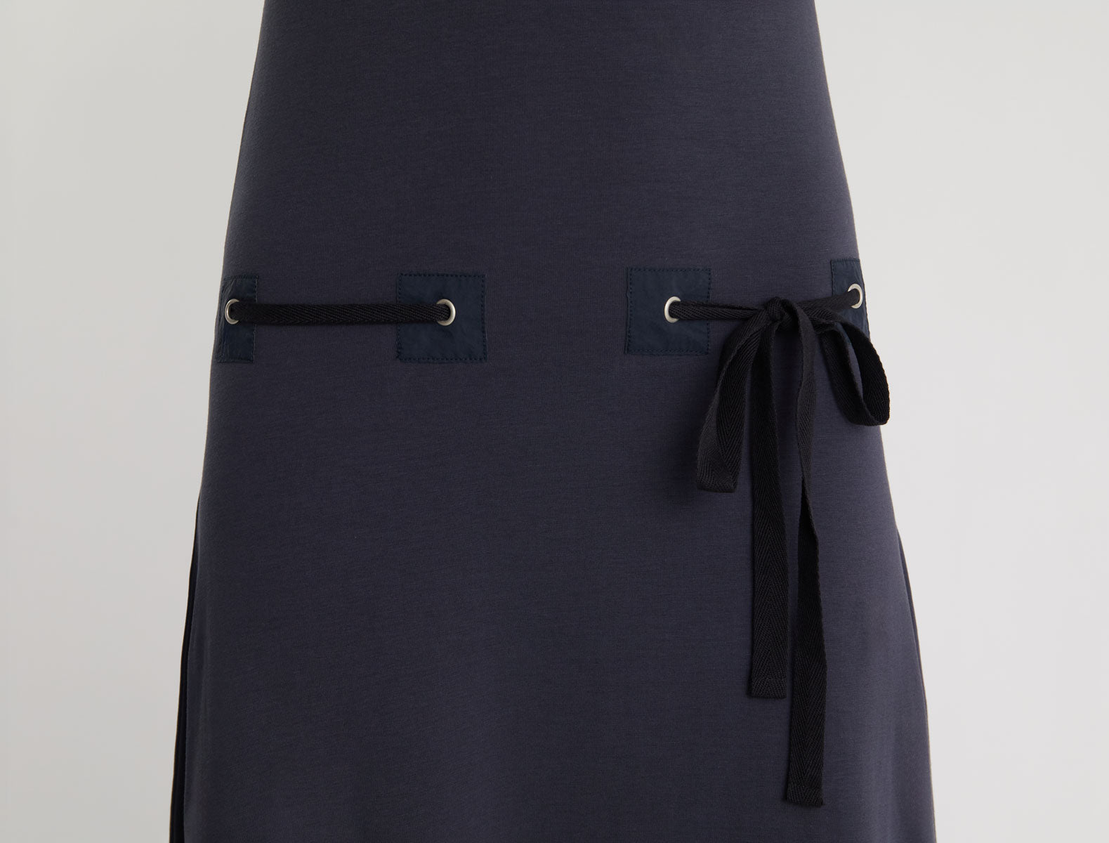 SUNI-Blue dress with fabric patch details at the hips featuring
