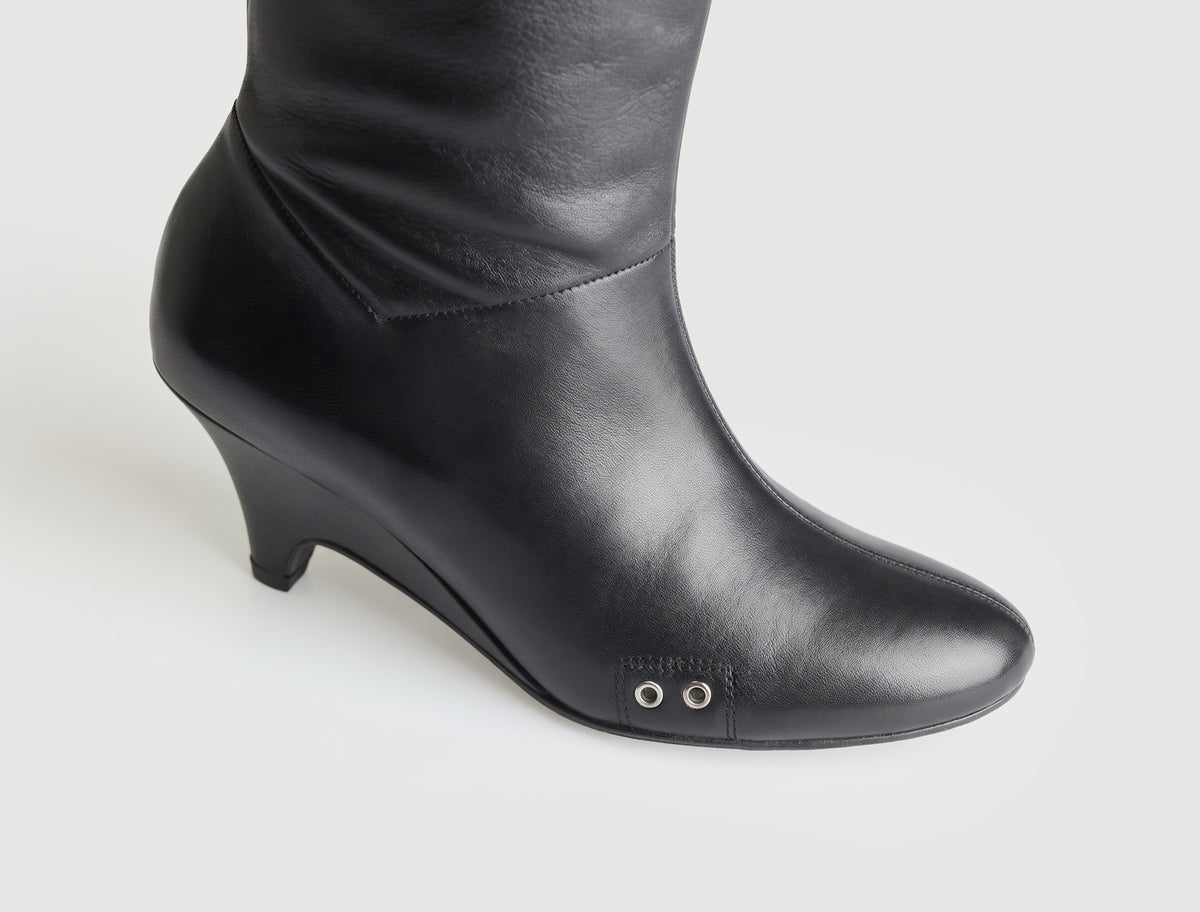 Joelia boot shaped wedge leather boot metal vent detailing black