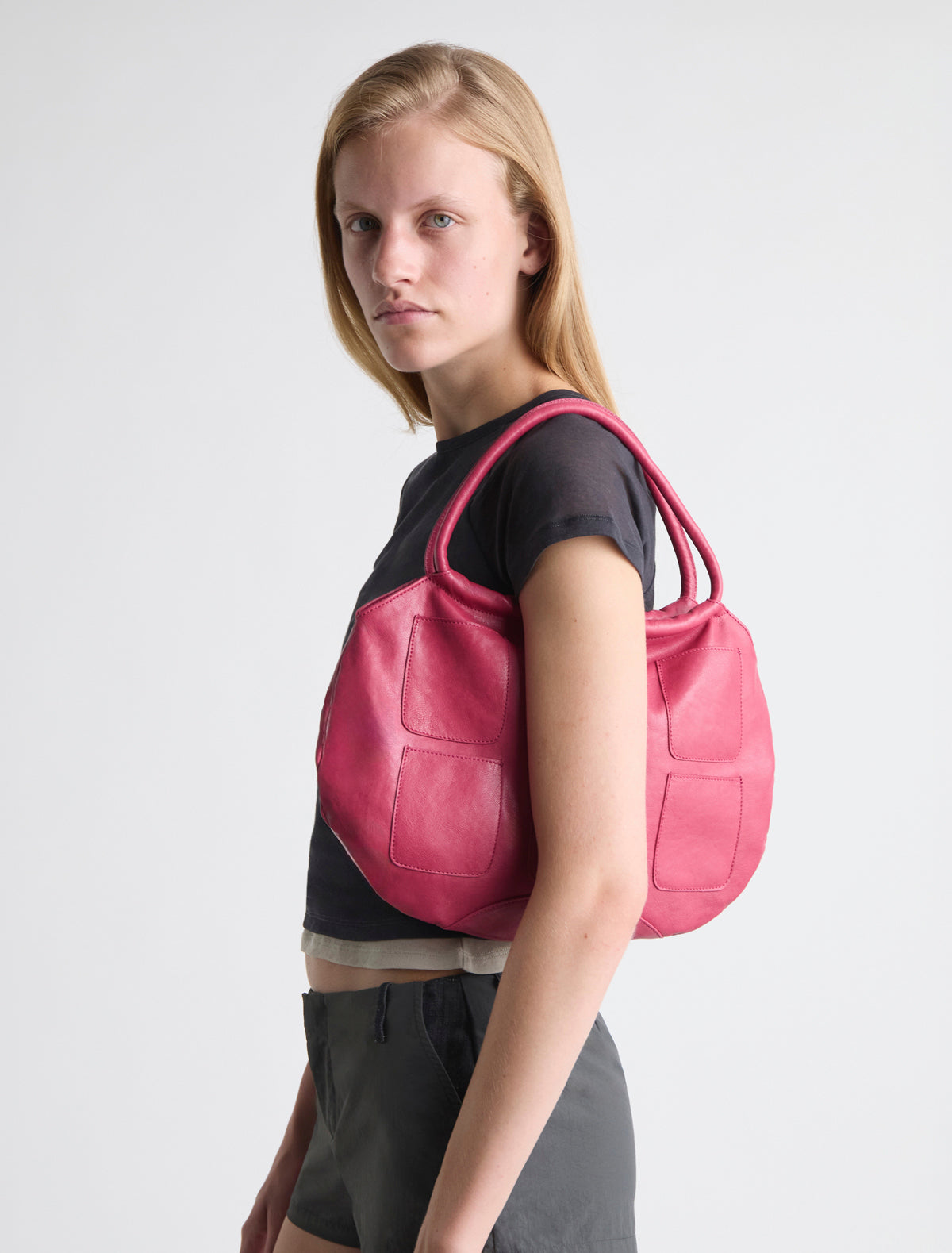 Pockets round shaped shoulder bag multiple pocket details fuchsia