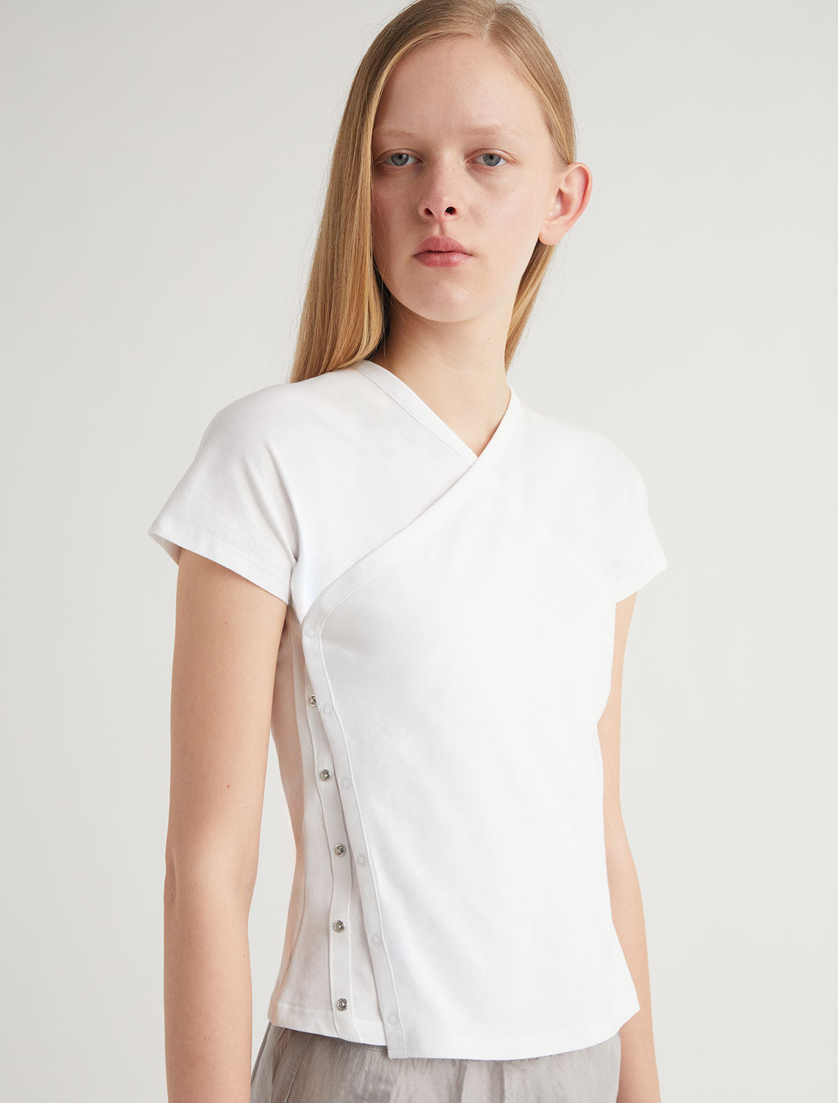 Olimpia crossed ranglan top snap closures embroidered detail white