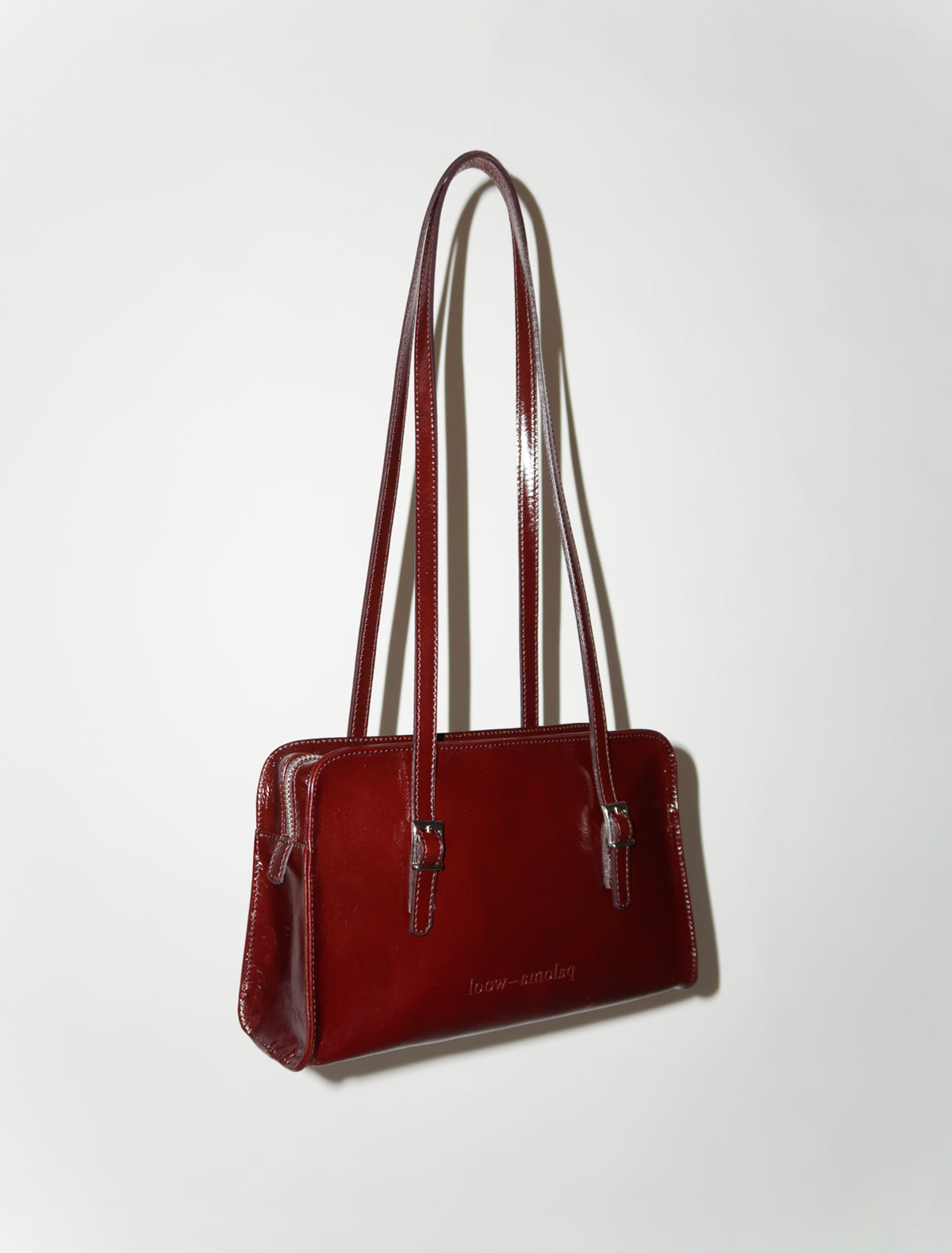 CAYETANO- Brown leather bag with engraved logo by Paloma Wool