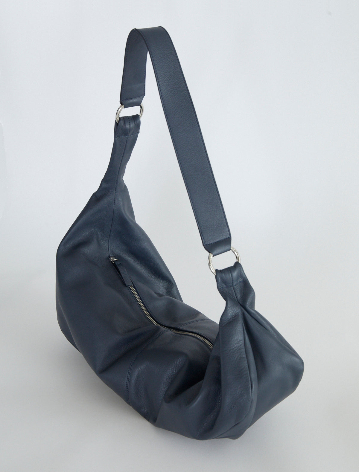 Dry elongated wrap around hobo style shoulder bag navy