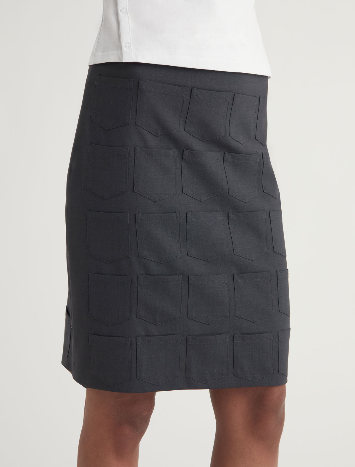 QUINA POCKETS-Mid-length skirt featuring mini pocket details