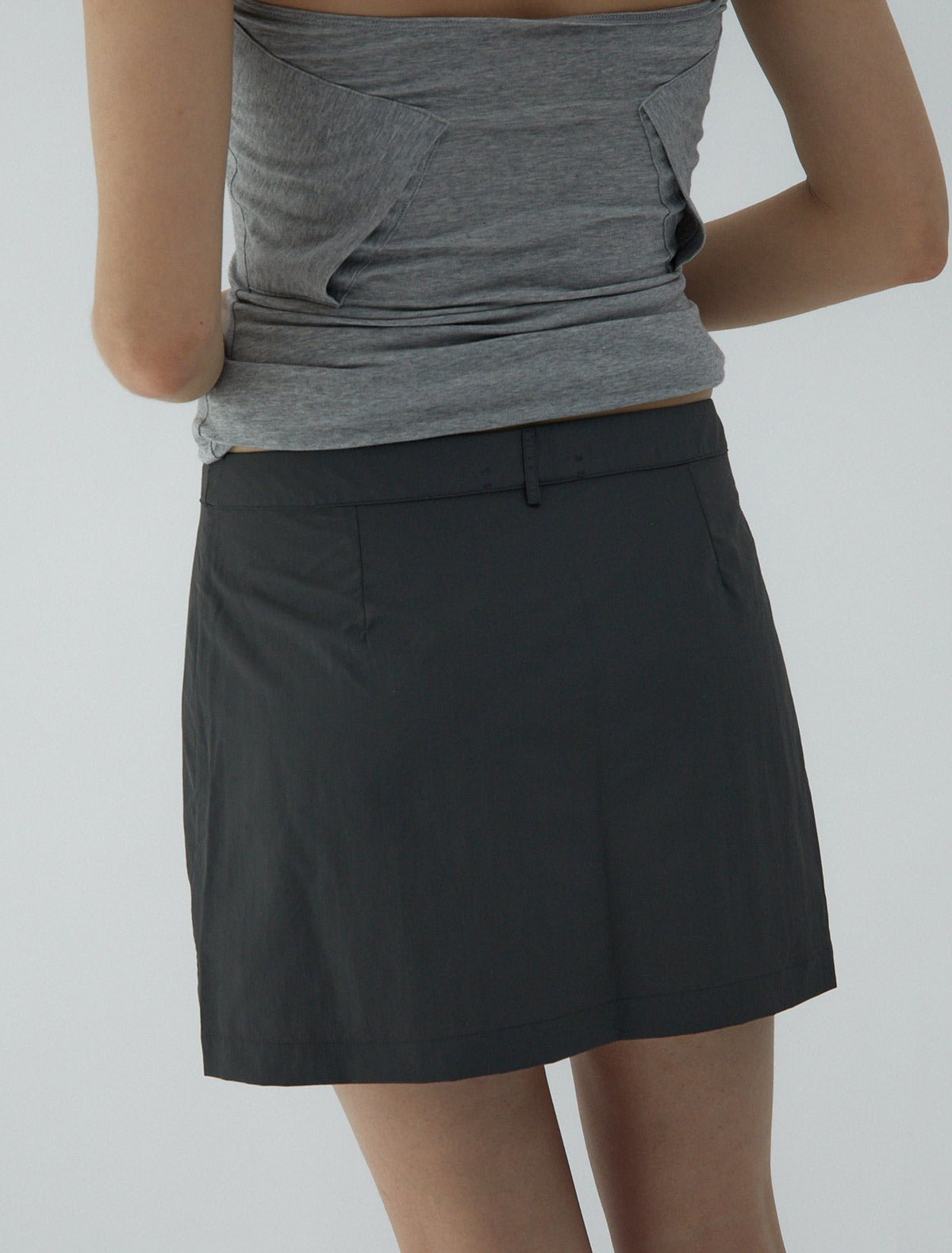 Mini ice tea nylon mini skirt central button closure