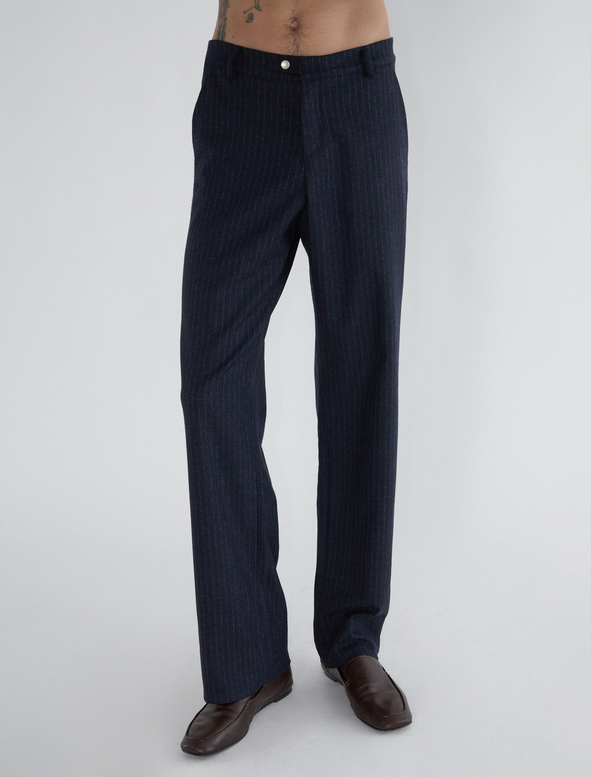 ARZE-Men’s trousers with a black tab detail and snap buttons at the hem ...
