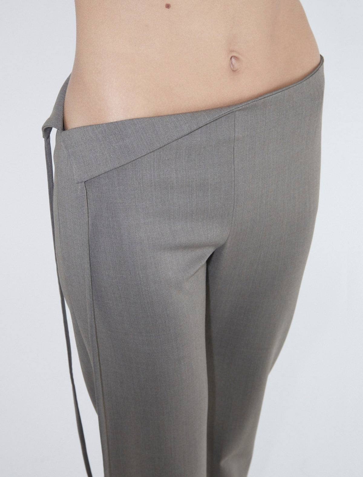 SANDAL-Light brown low-waist pants with a folded piece in the