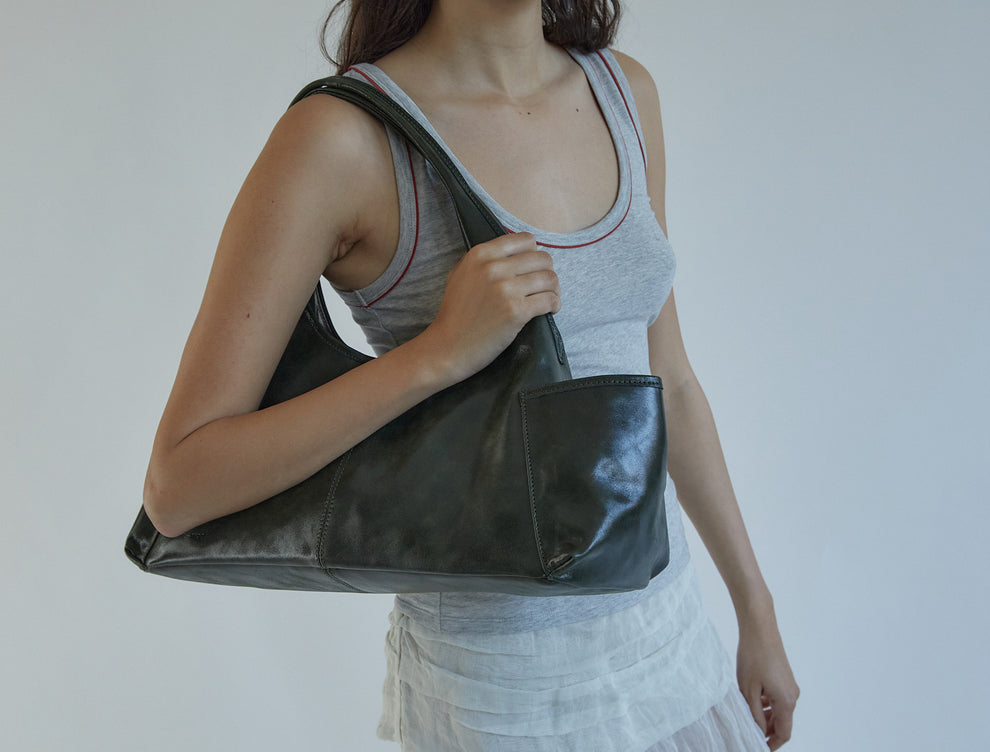 QUERIDA POCKETS-Khaki triangular-shaped shoulder bag. Fit for laptops ...