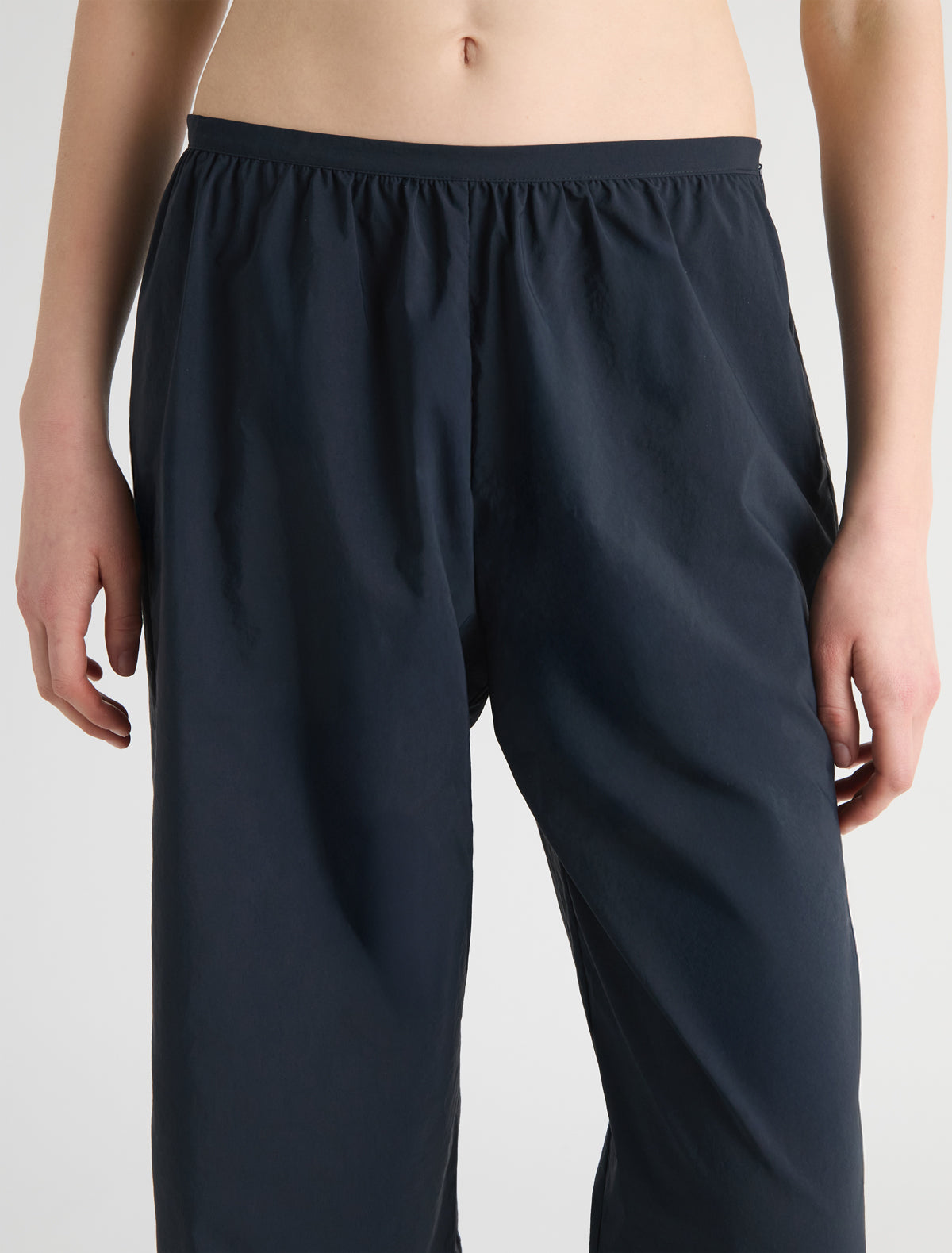 BOZA-Navy balloon-style pants made from soft nylon with a slight