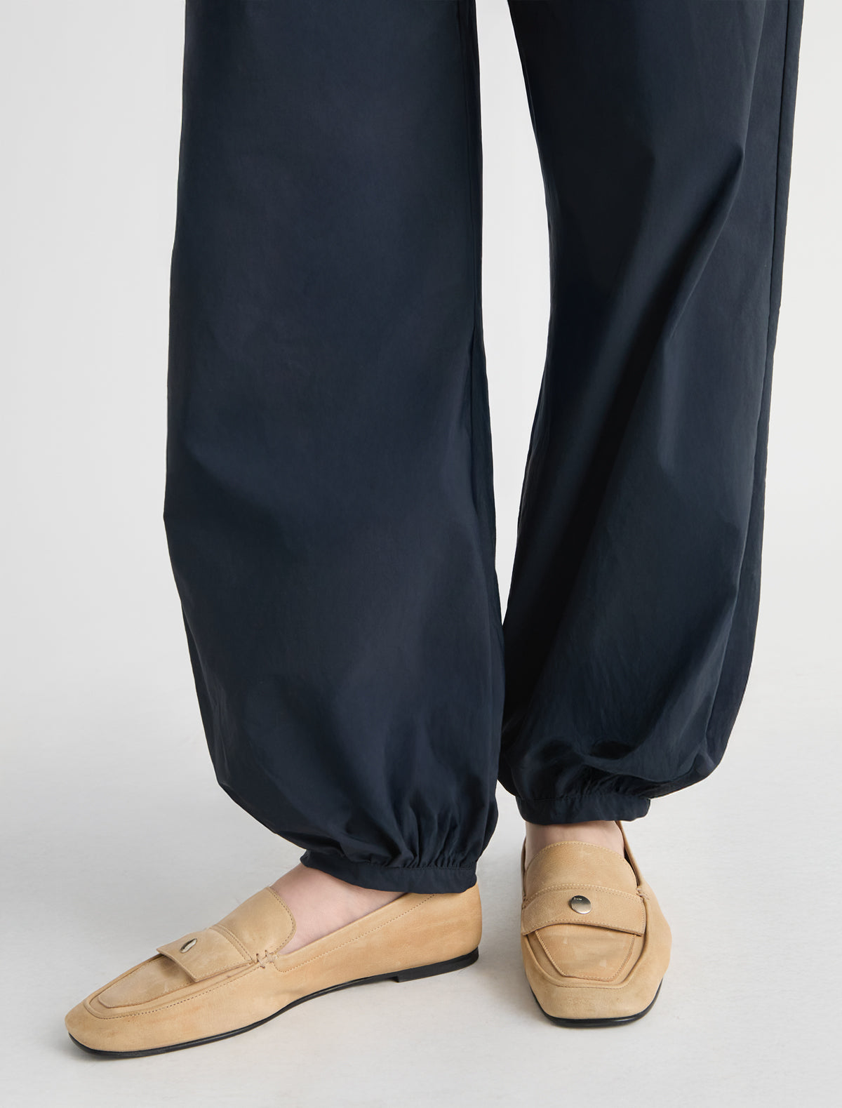 BOZA-Navy balloon-style pants made from soft nylon with a slight