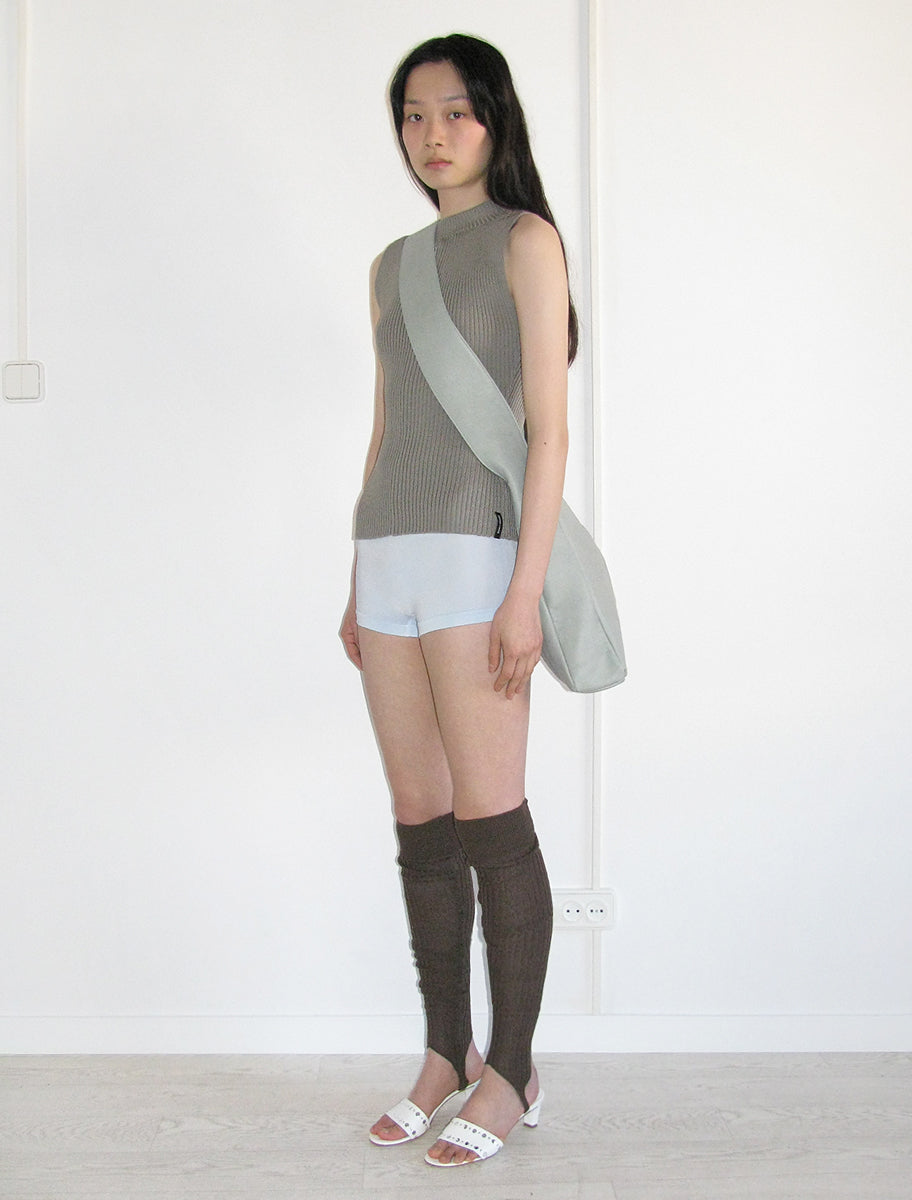ATORI-Black knitted sleeveless top with front chest zip